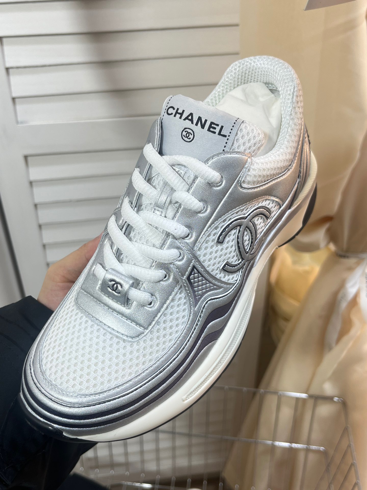 CHANEL Gold and silver horn king sneakers