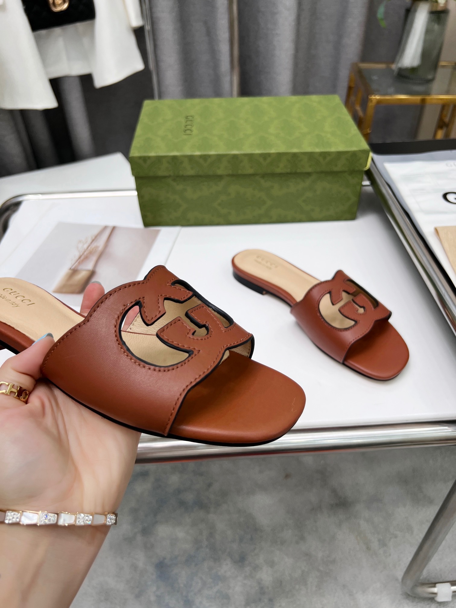 Gucci Women's interlocking double G hollow-out detail slippers