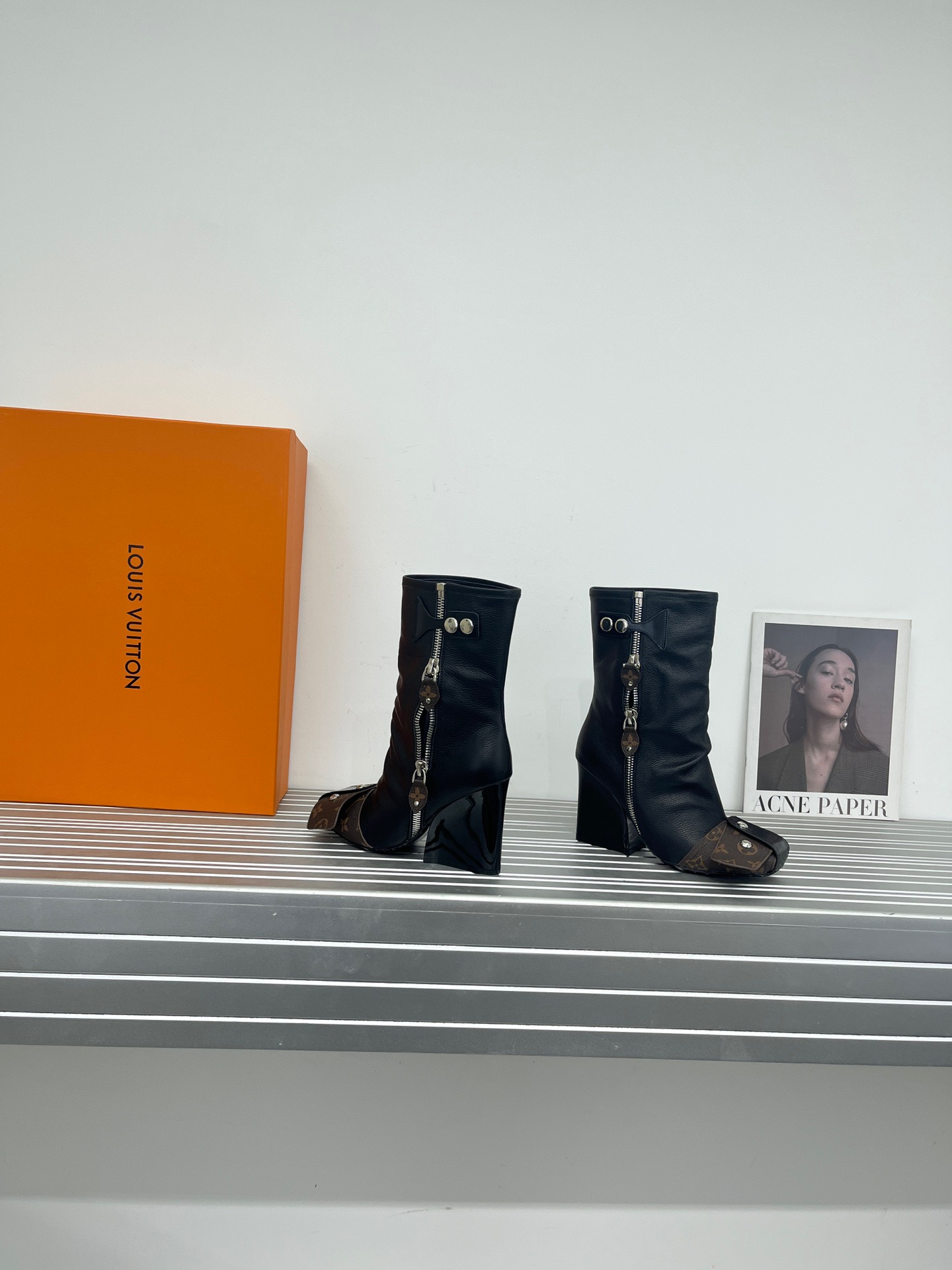 LV Metal nailed back zipper ankle boots