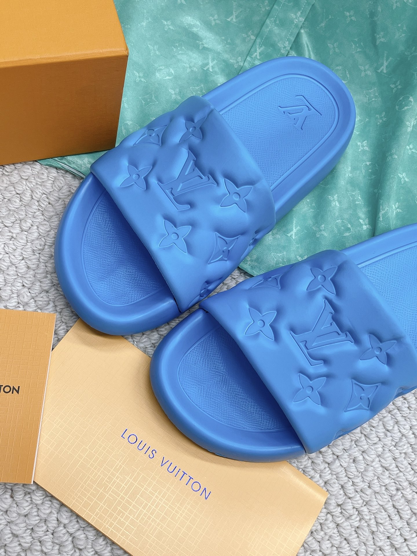LOUIS VUITTON SLIDES