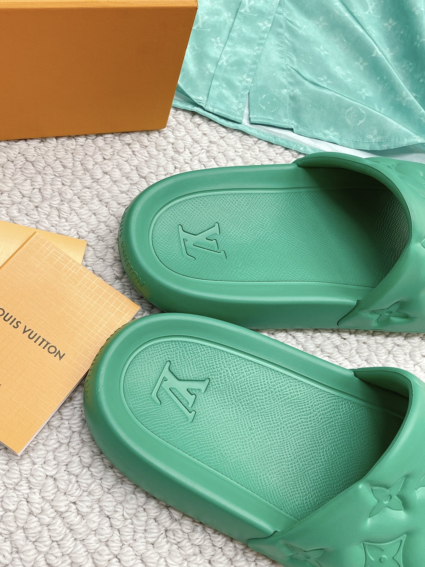 LOUIS VUITTON SLIDES