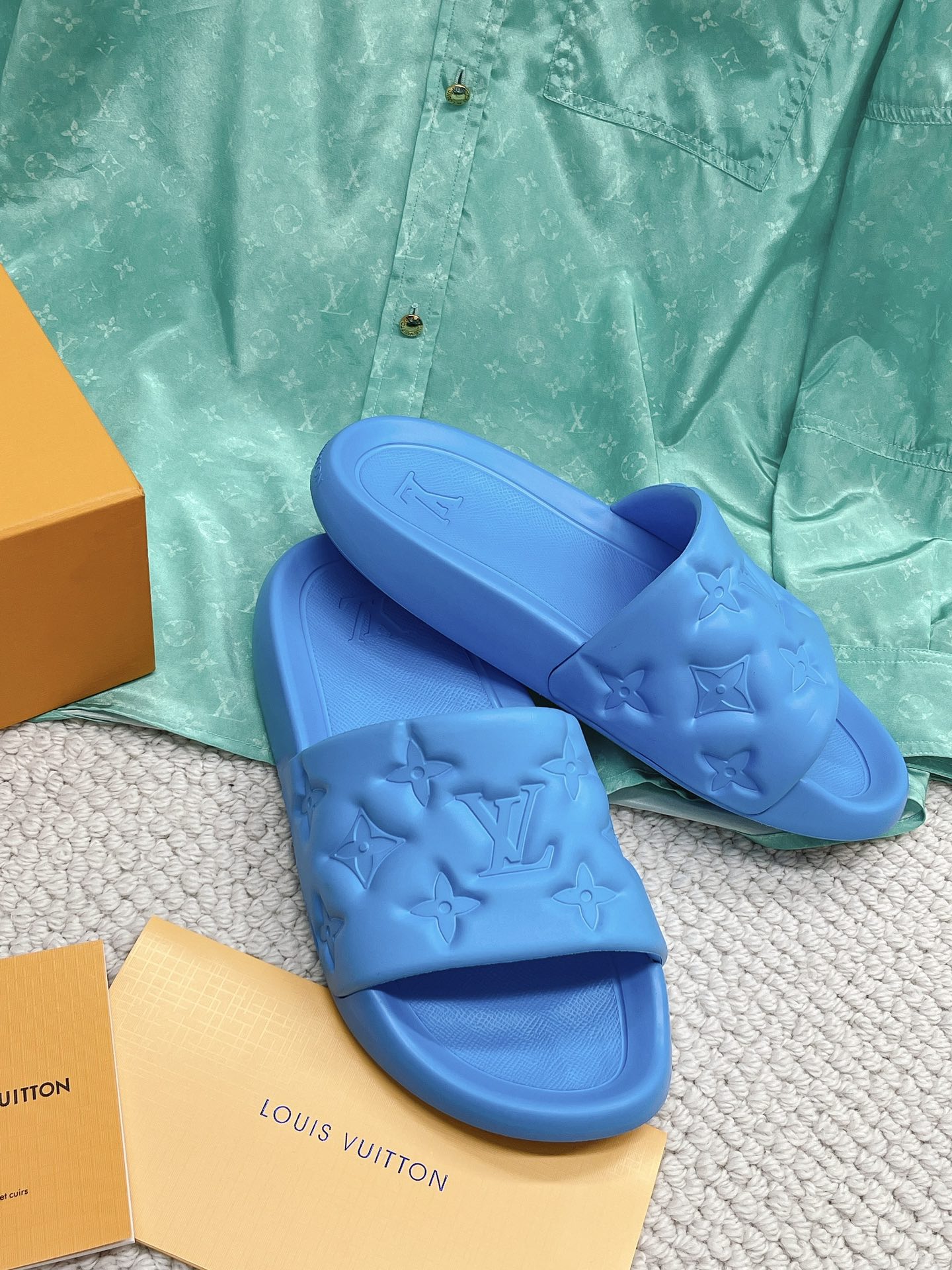 LOUIS VUITTON SLIDES