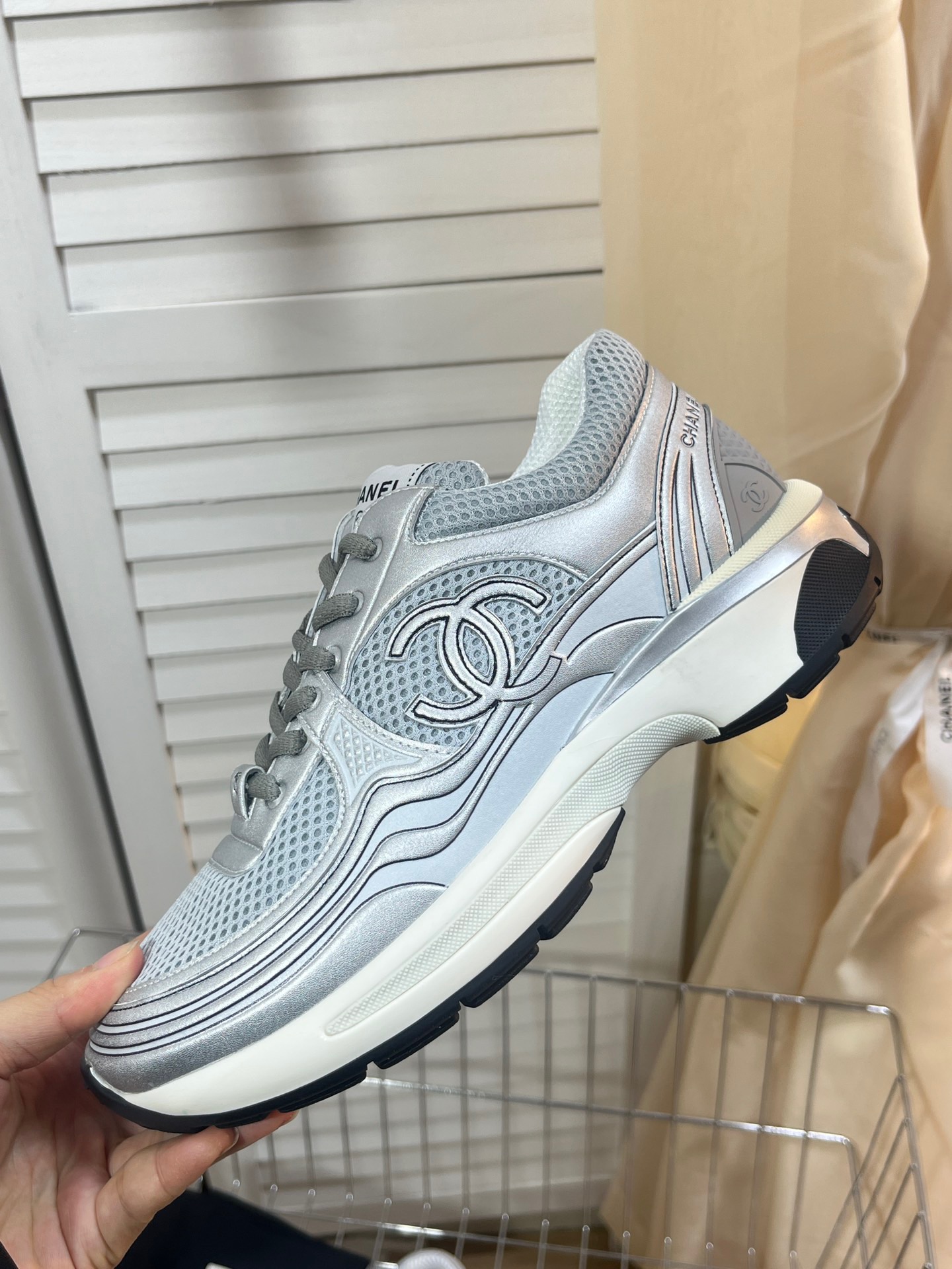 CHANEL Gold and silver horn king sneakers