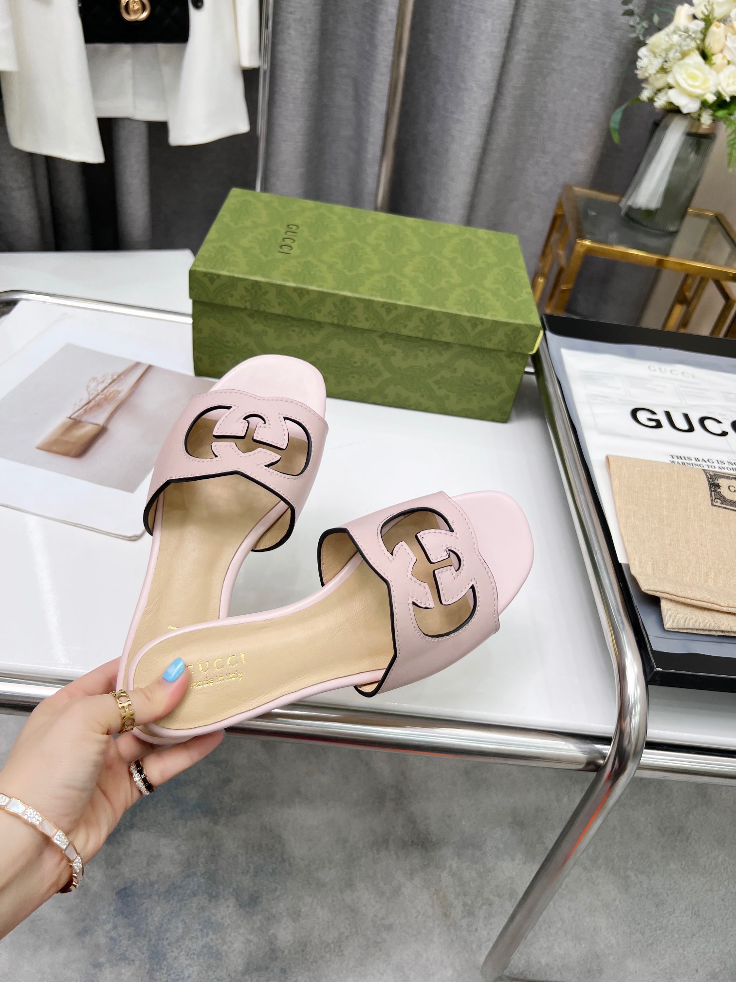 Gucci Women's interlocking double G hollow-out detail slippers