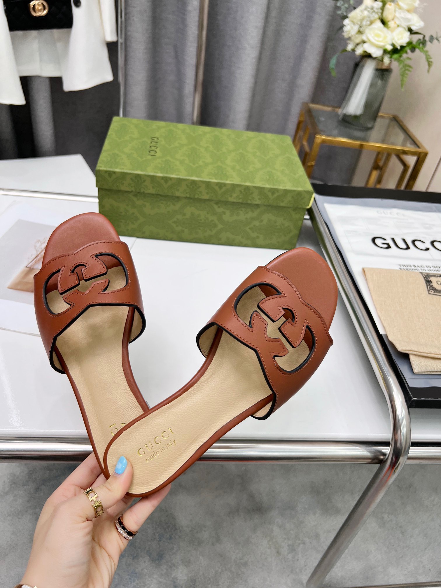 Gucci Women's interlocking double G hollow-out detail slippers