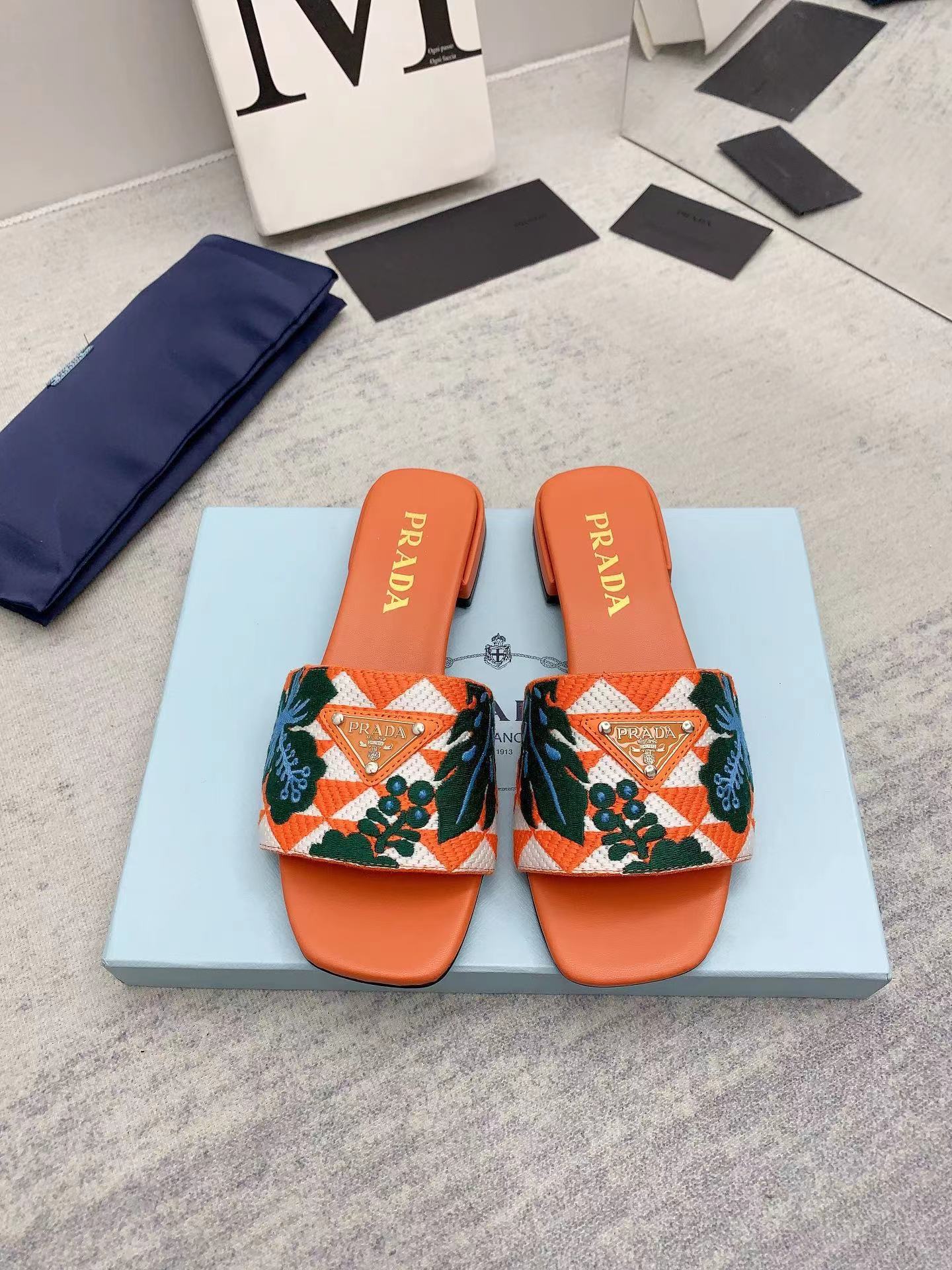 PRADA Triangle printed fabric slippers