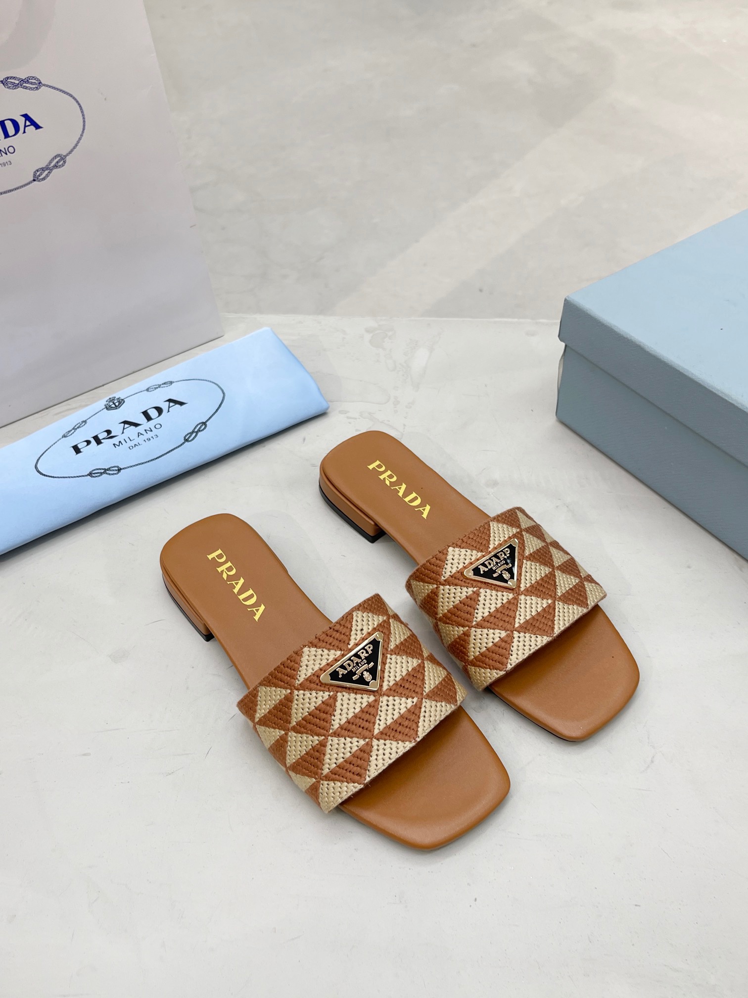 PRADA Triangle printed fabric slippers