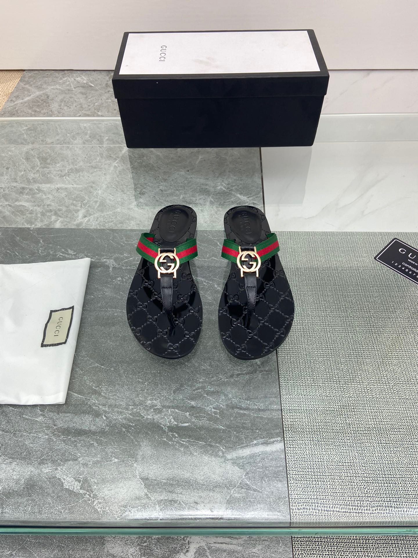 GUCCI Double G style leather flip-toe sandals