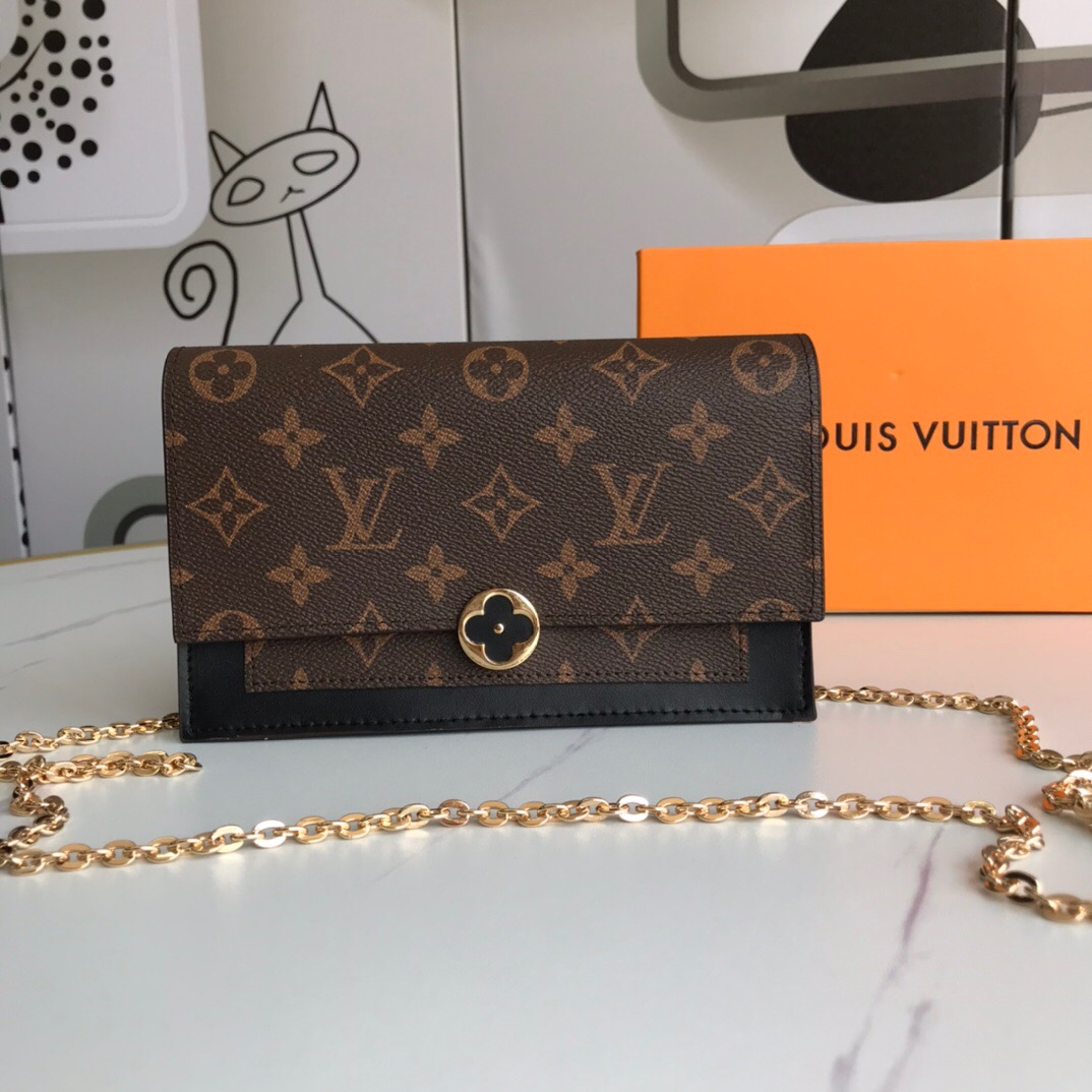 LV A four-leaf clover purse