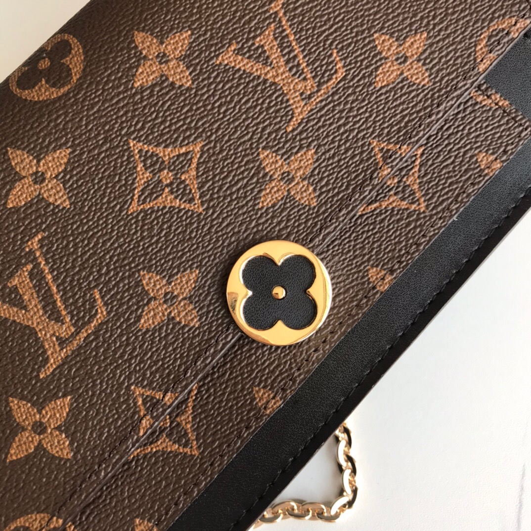LV A four-leaf clover purse