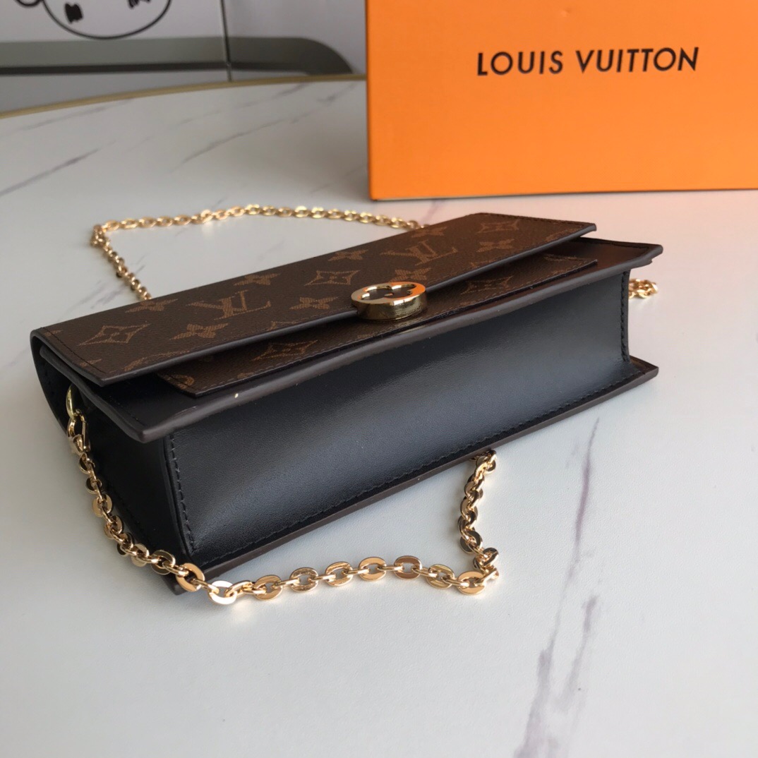 LV A four-leaf clover purse