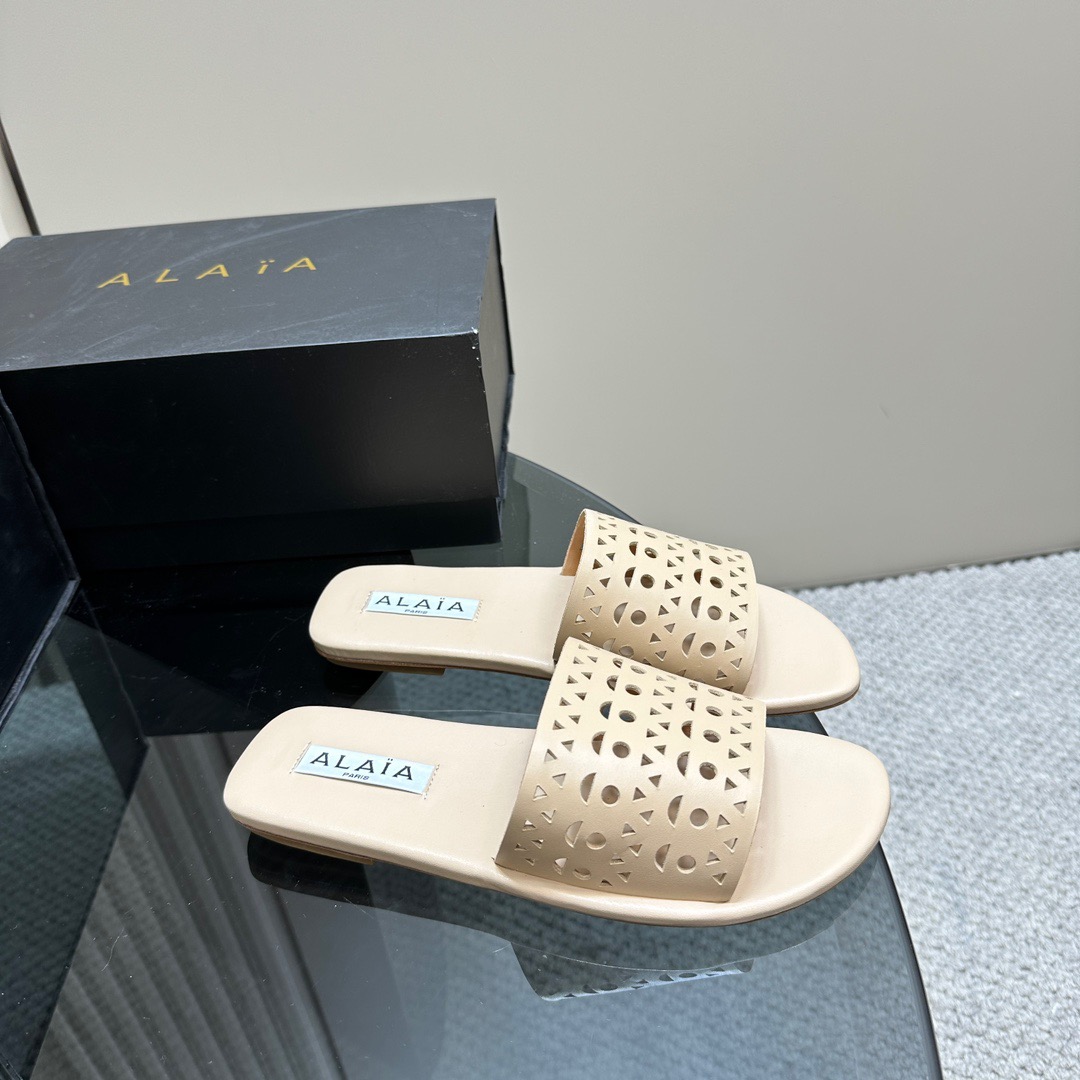 ALAIA cut-out open-toed flat slippers
