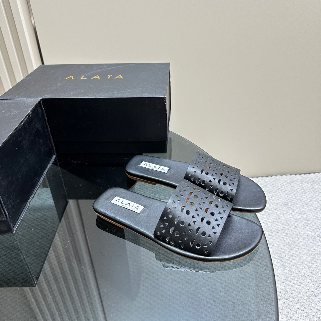 ALAIA cut-out open-toed flat slippers