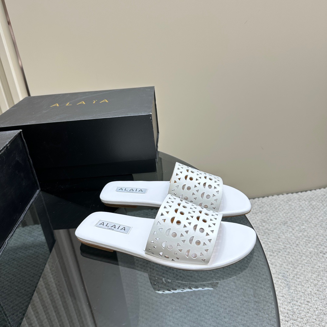 ALAIA cut-out open-toed flat slippers