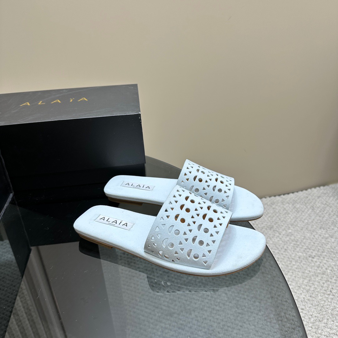 ALAIA cut-out open-toed flat slippers