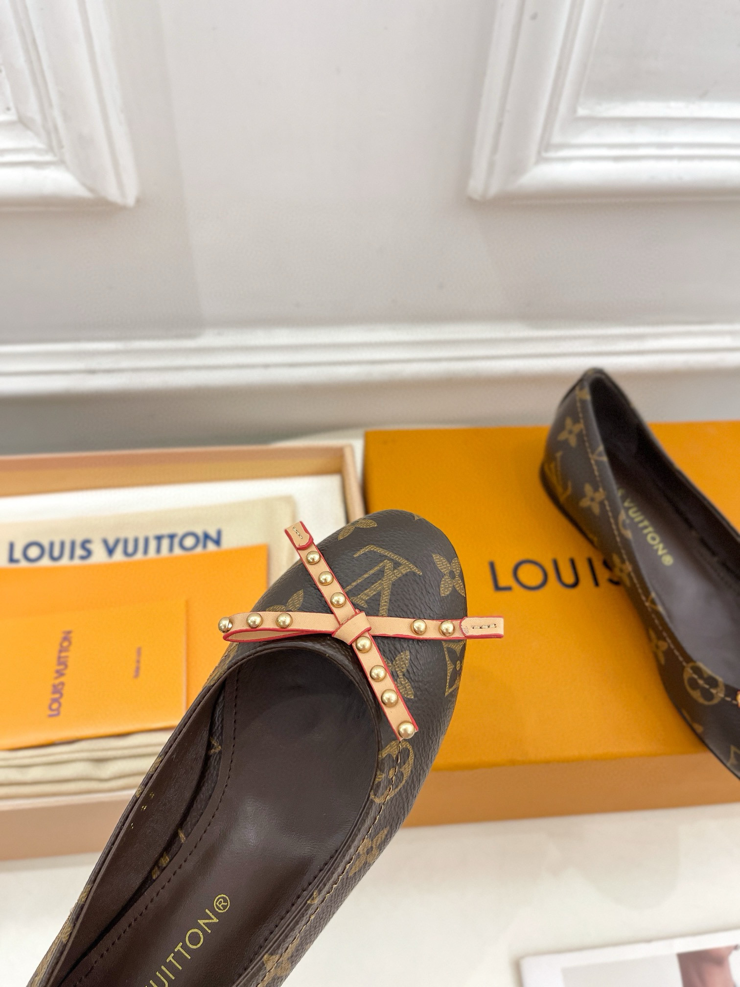 LV NINA round head bow studded ballet shoes