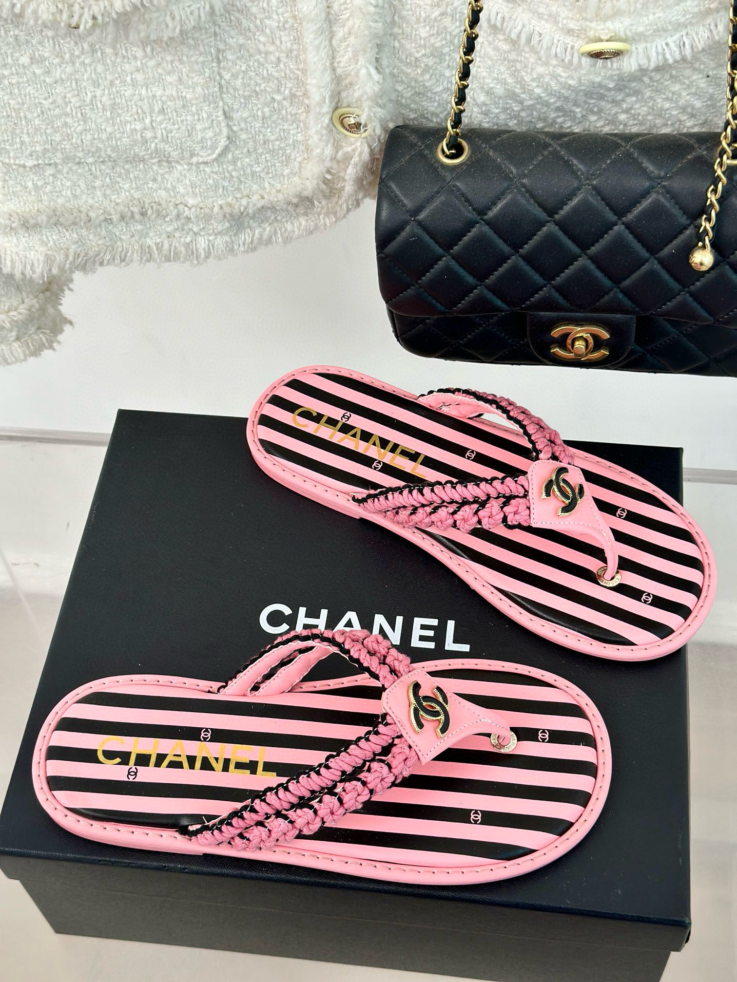 CHANEL Striped flip-flops