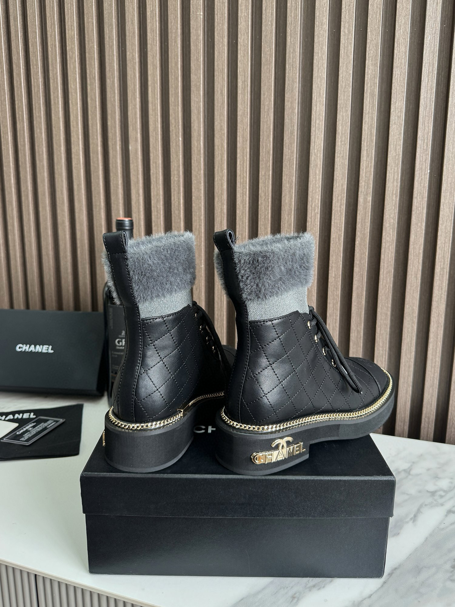 CHANEL ankle boots with fur collar