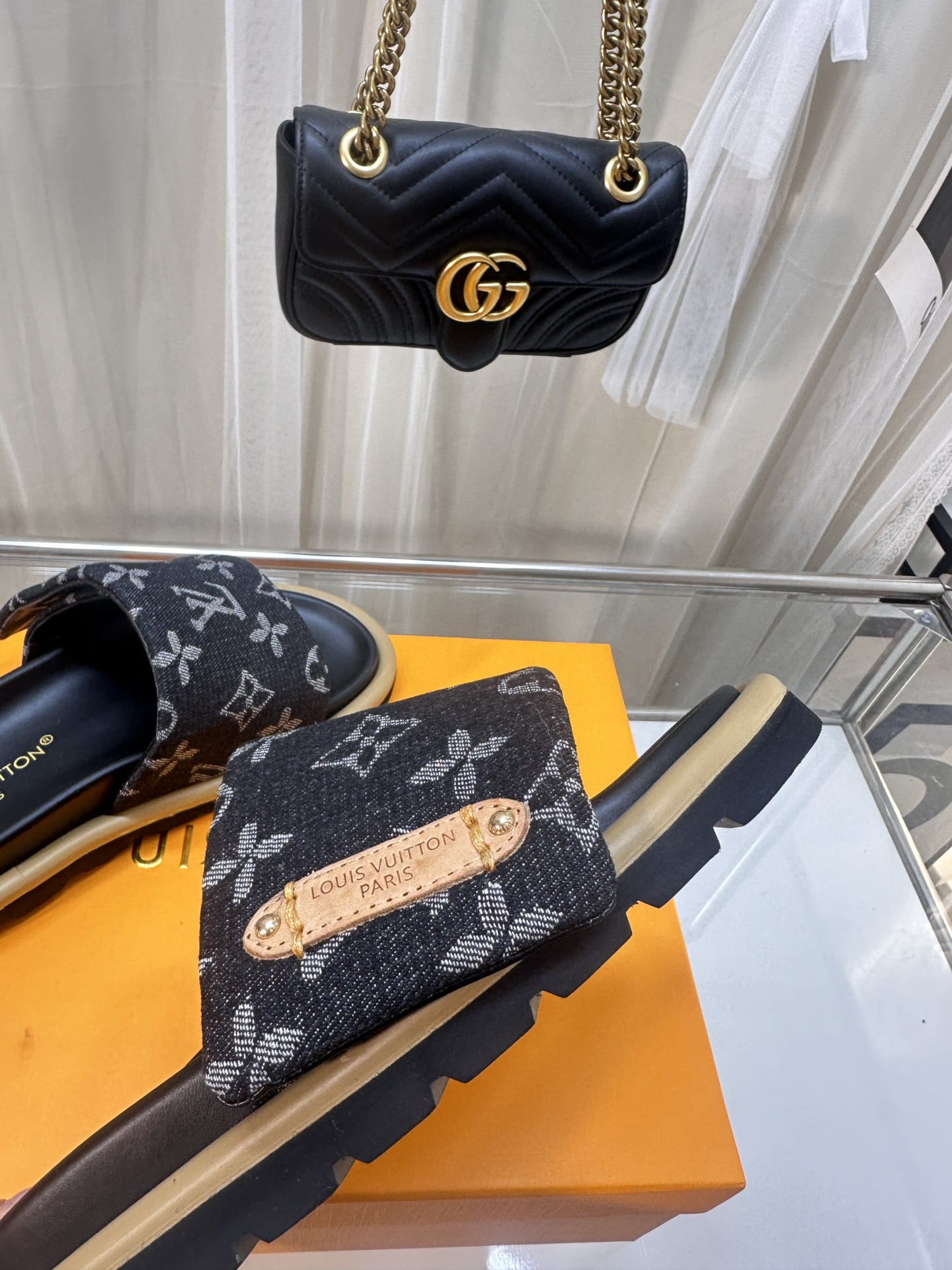 LOUIS VUITTON SLIDES