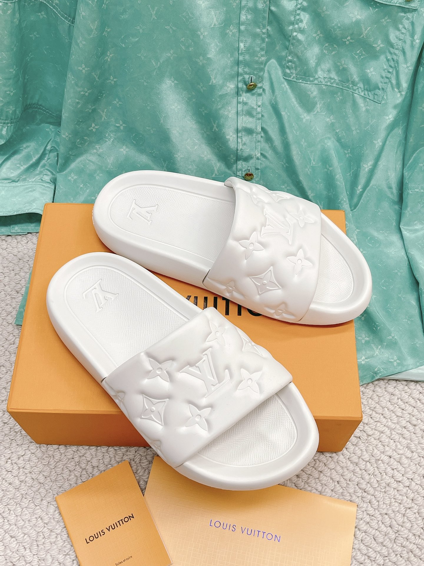 LOUIS VUITTON SLIDES