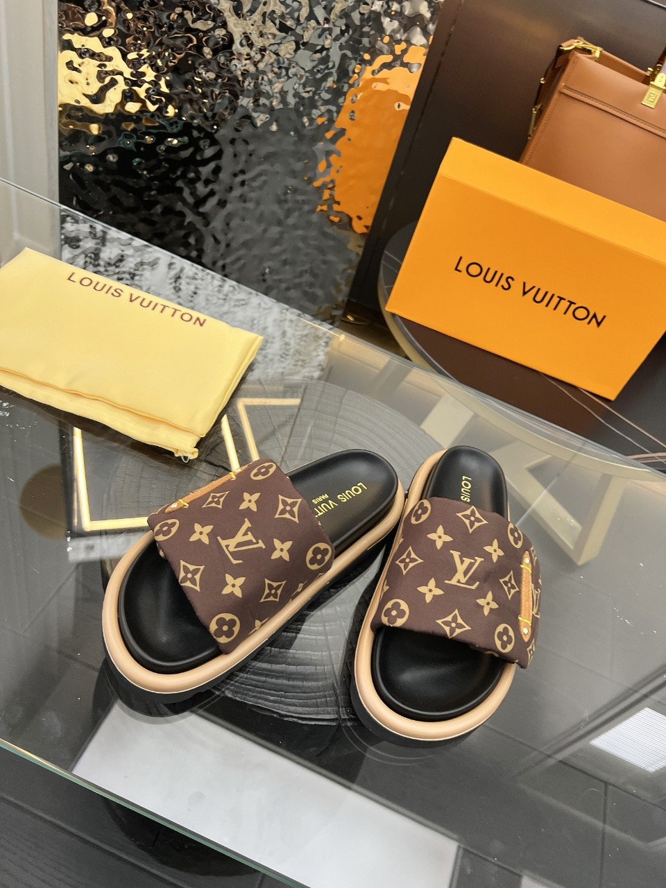LOUIS VUITTON SLIDES