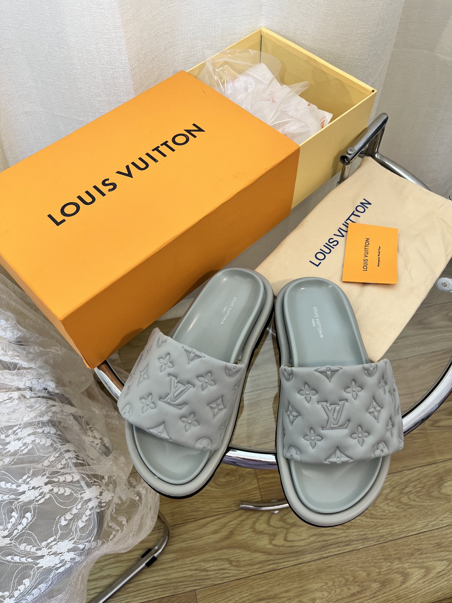 LOUIS VUITTON SLIDES