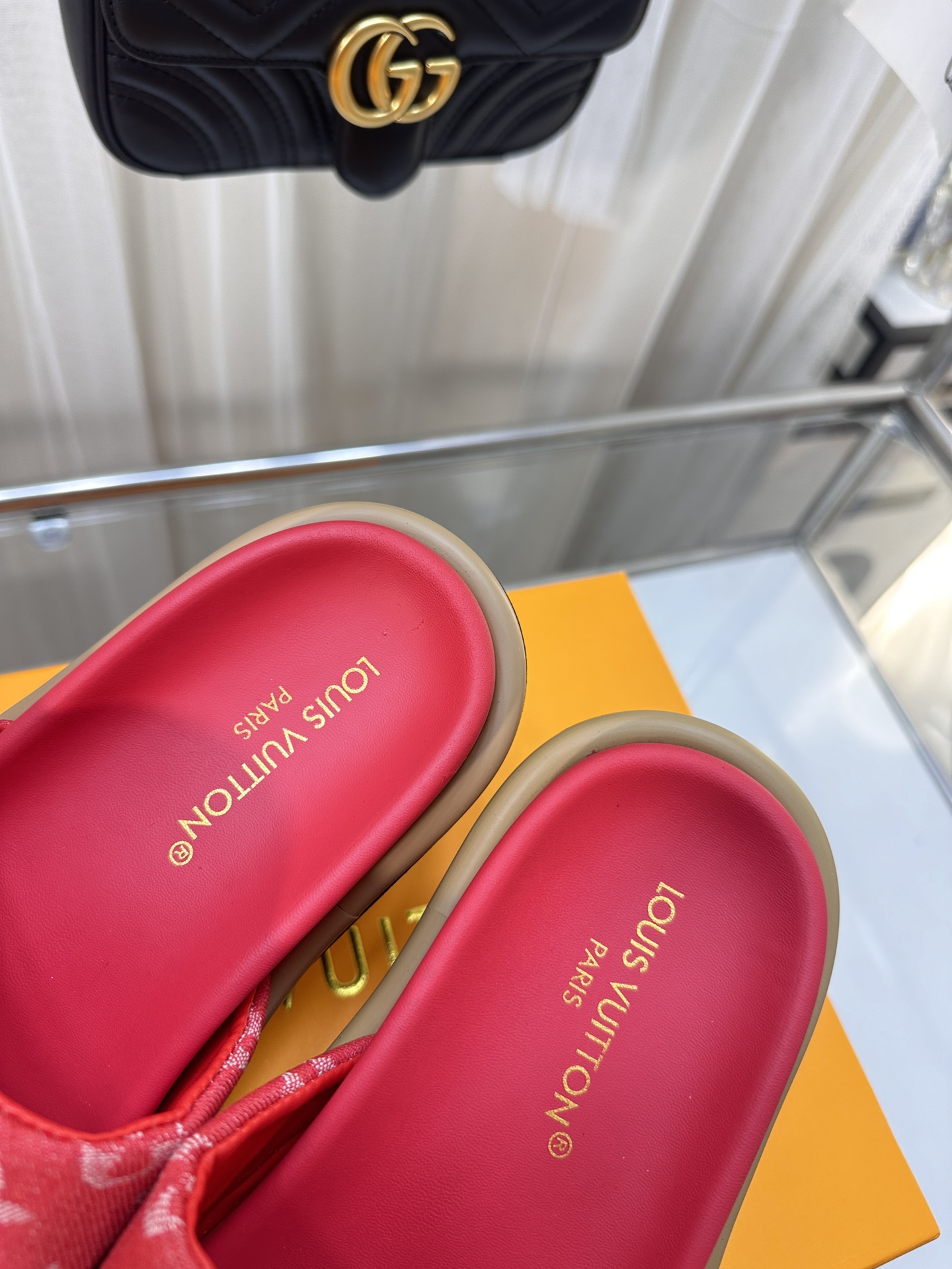 LOUIS VUITTON SLIDES