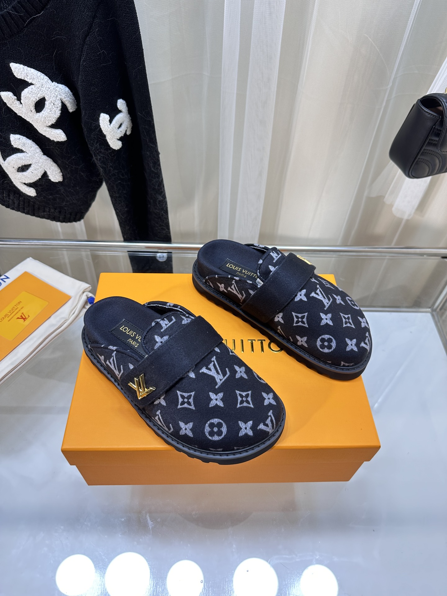 LOUIS VUITTON SLIDES