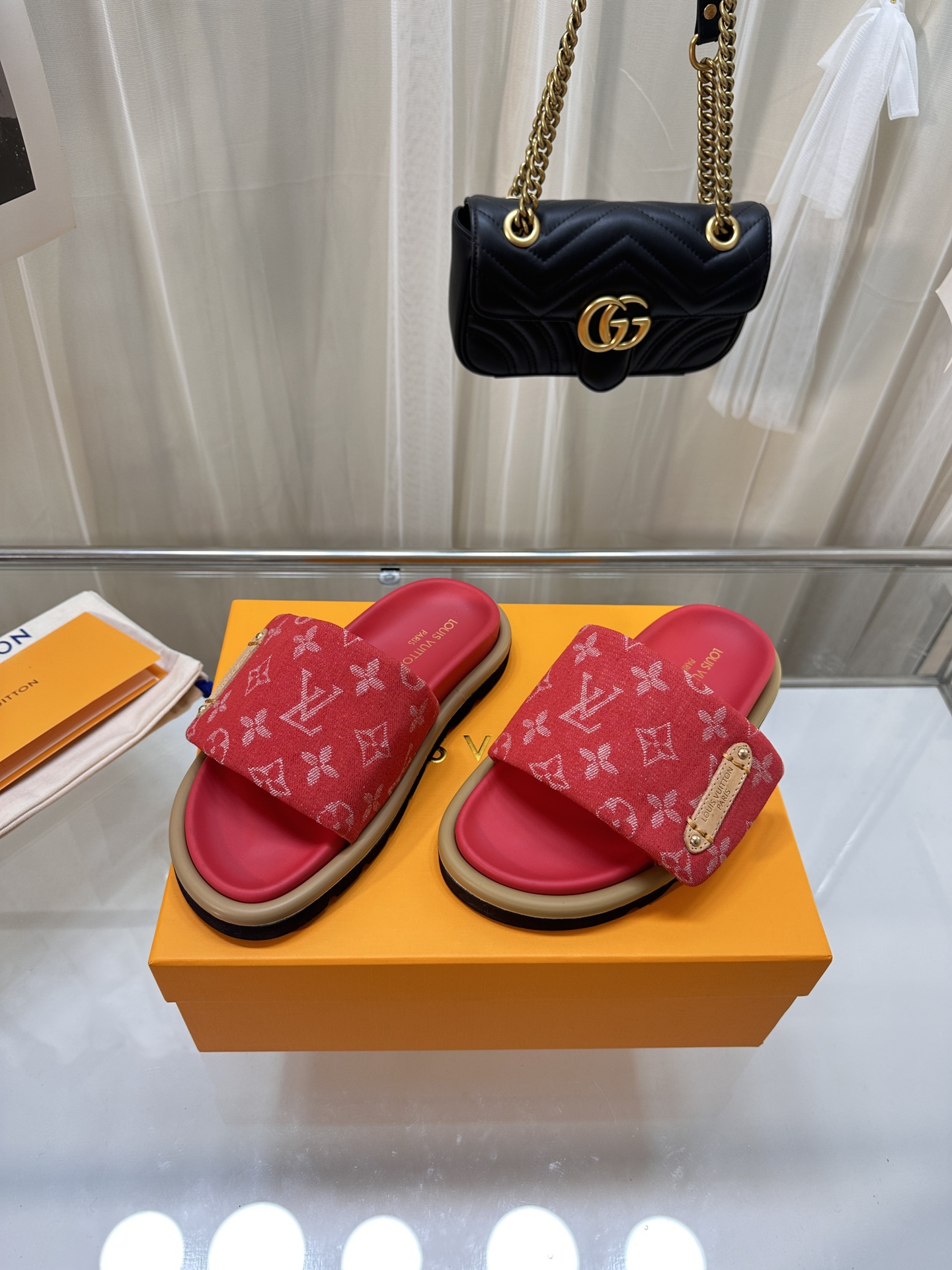 LOUIS VUITTON SLIDES