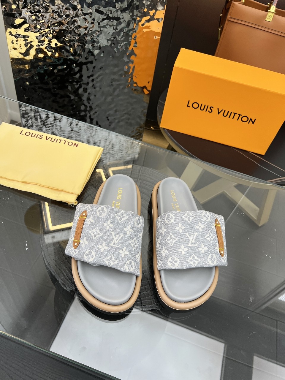 LOUIS VUITTON SLIDES