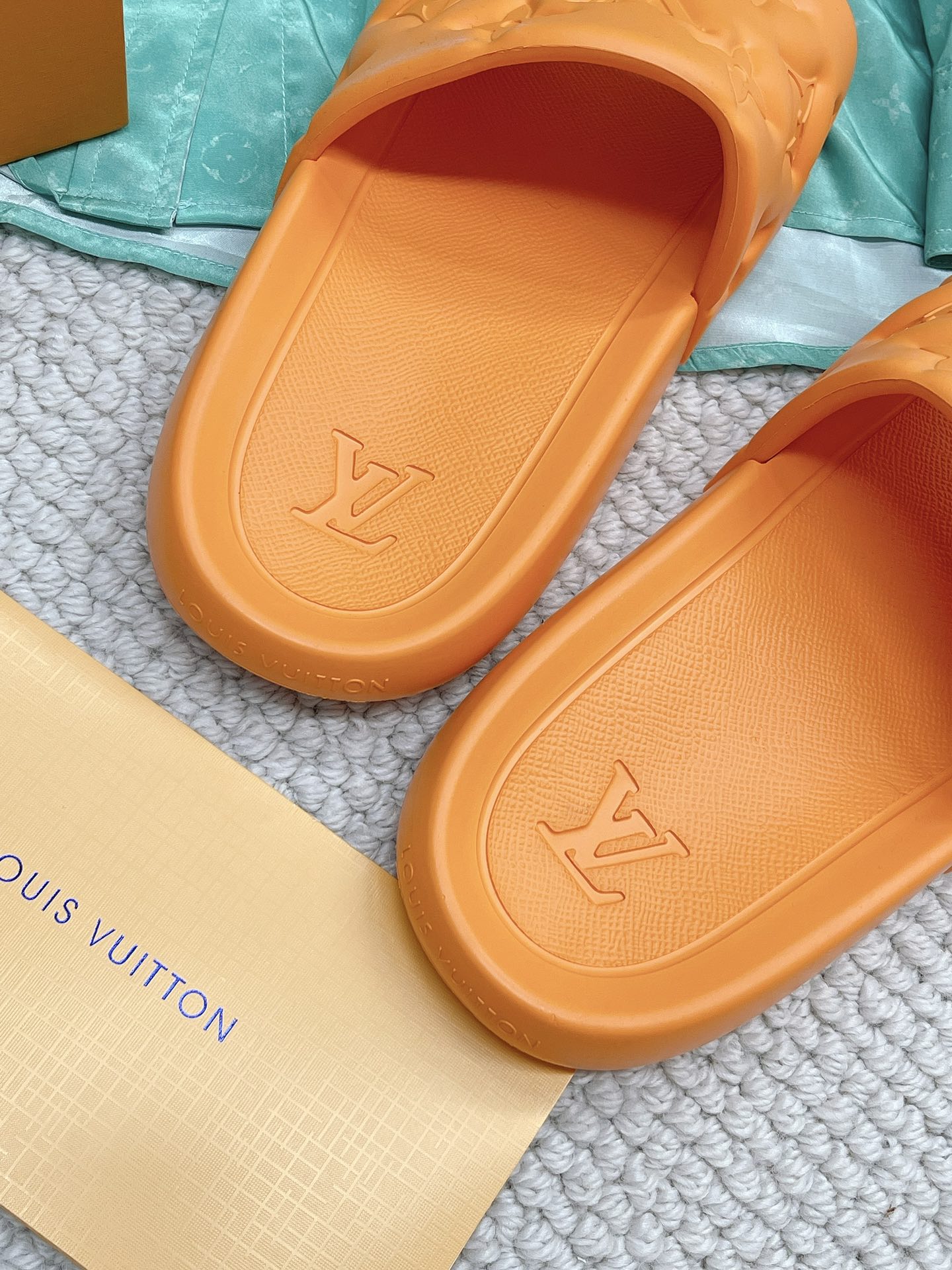 LOUIS VUITTON SLIDES