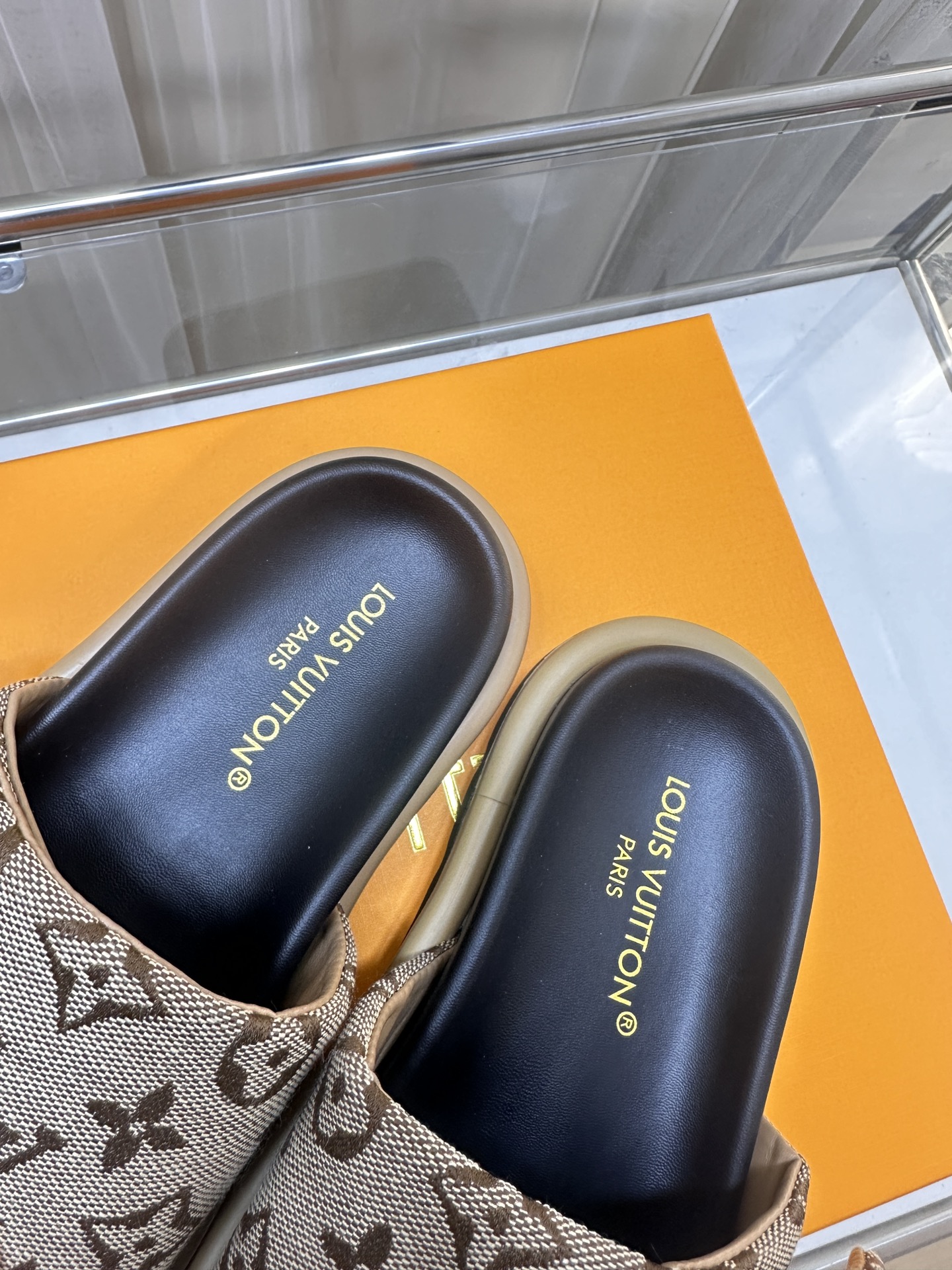 LOUIS VUITTON SLIDES