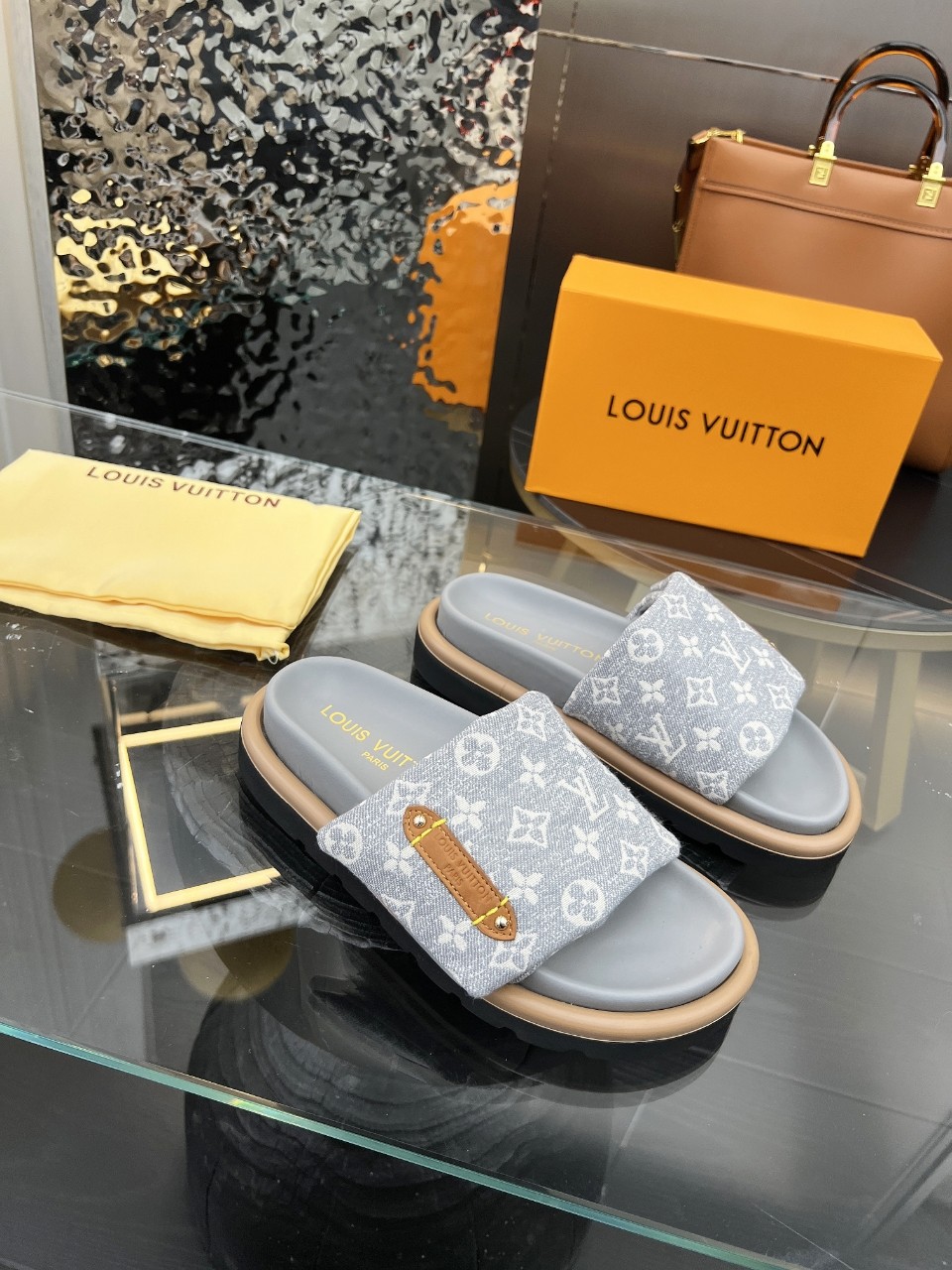 LOUIS VUITTON SLIDES